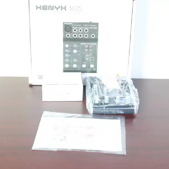 Behringer Xenyx 502S for live performances,